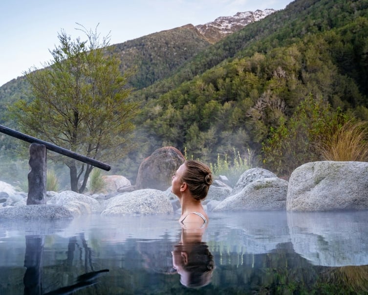 A woman bathing at Maruia Hot Springs