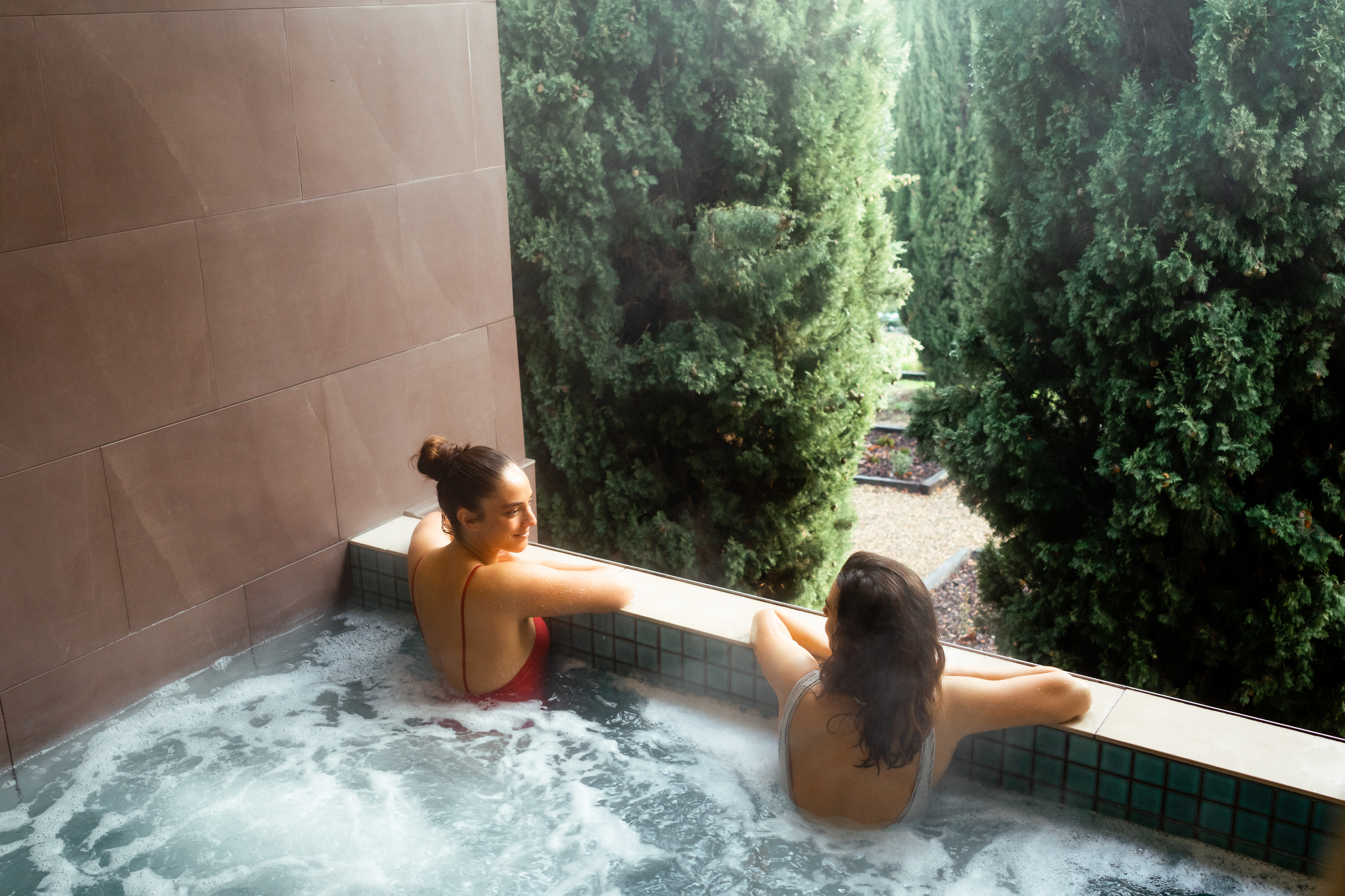 Two people bathing at the Mineral Springs Hotel