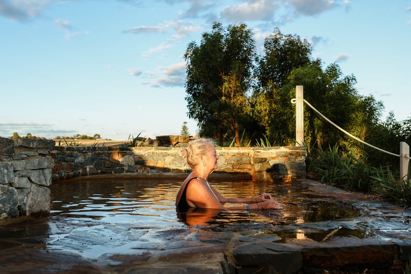 A woman bathing at the Hilltop Escarpment