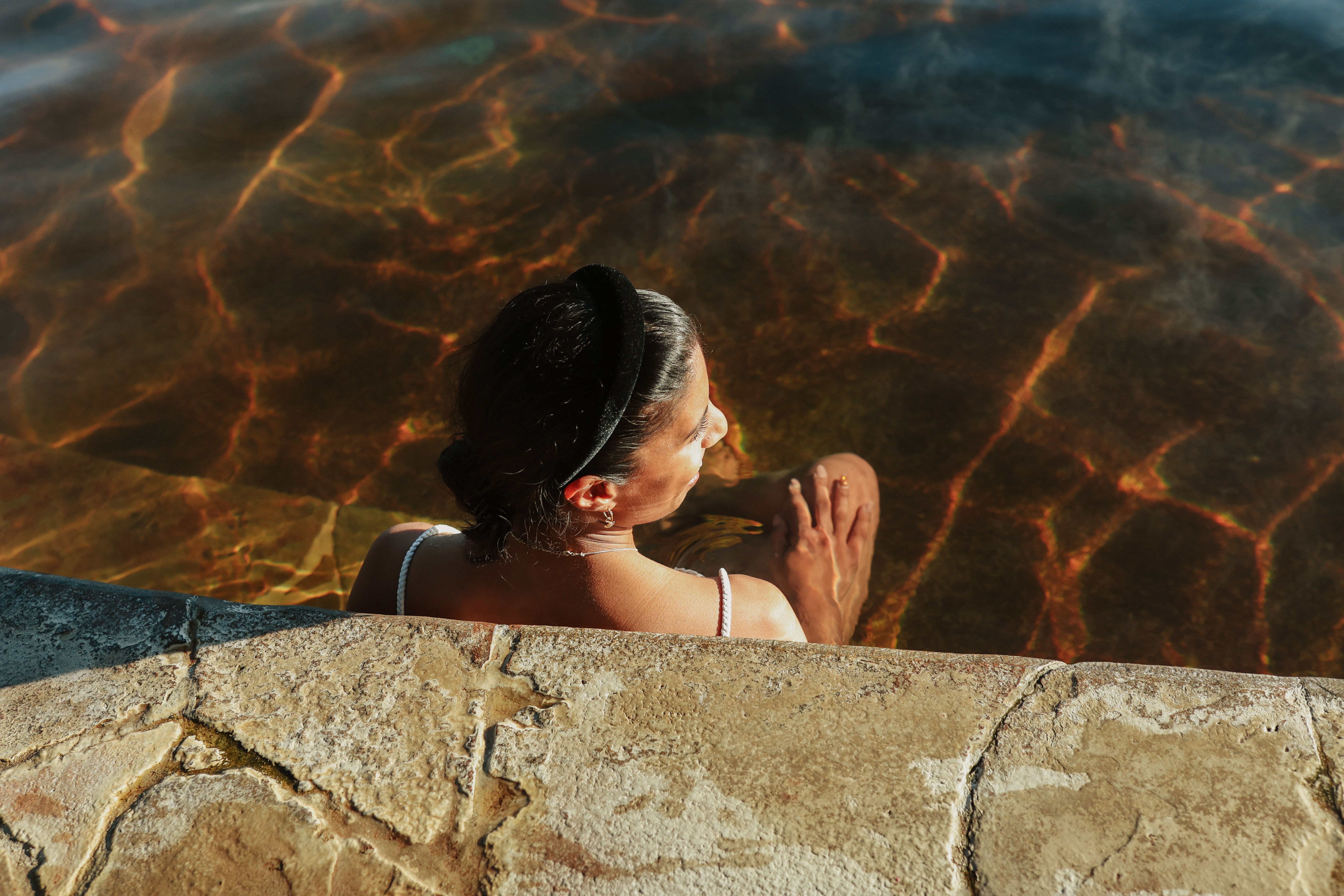A woman bathing in the Amphitheatre pools