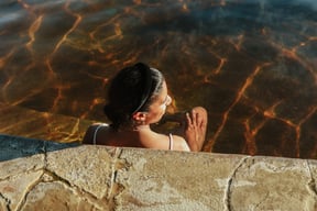 A woman bathing in the Amphitheatre pools