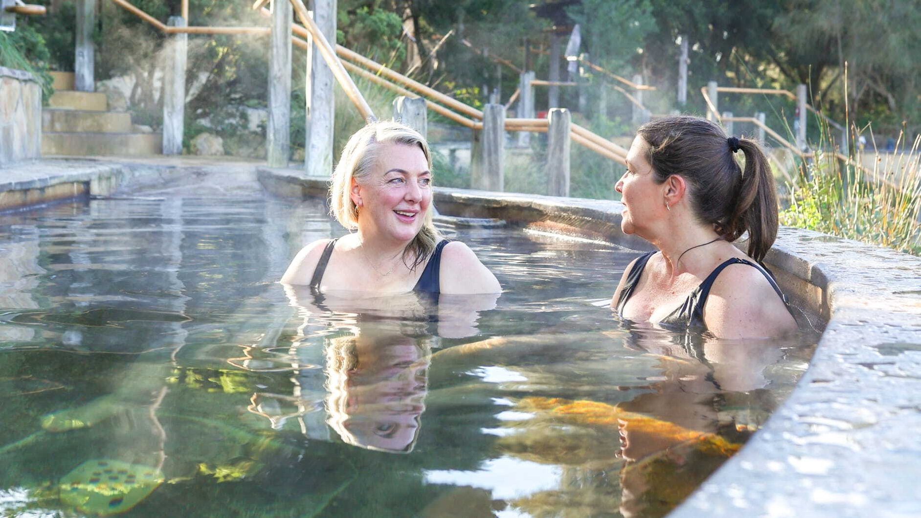 Two women bathing in the hot springs in the Amphitheatre