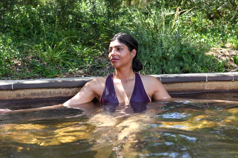 A woman bathing in hot springs
