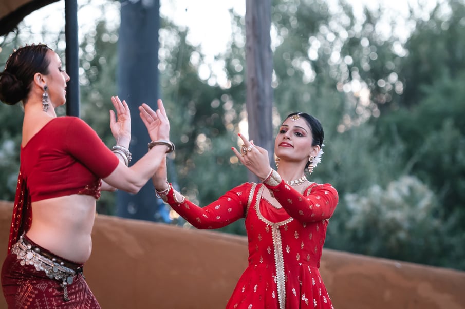 Two women performing as part of Diwali