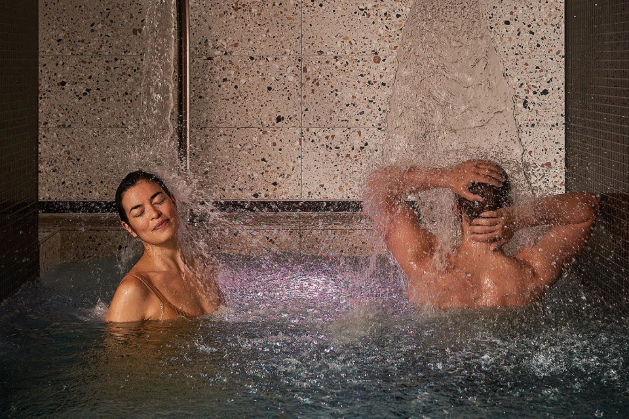 Two people bathing at Aurora Spa &amp; Bathhouse
