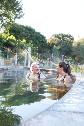 Two women bathing in the Bath House Amphitheatre