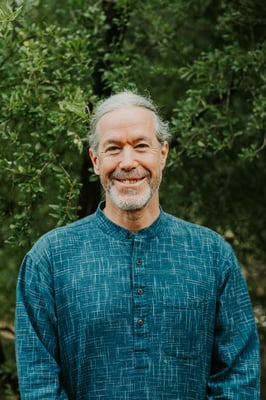 A headshot of Bharat Mitra