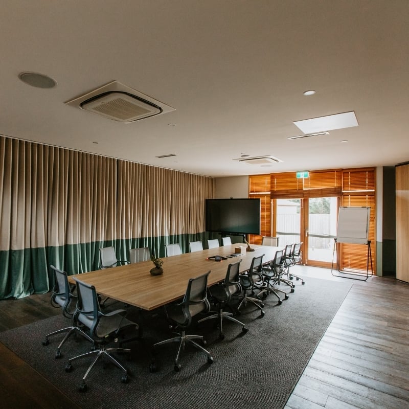A wide shot of the Boardroom