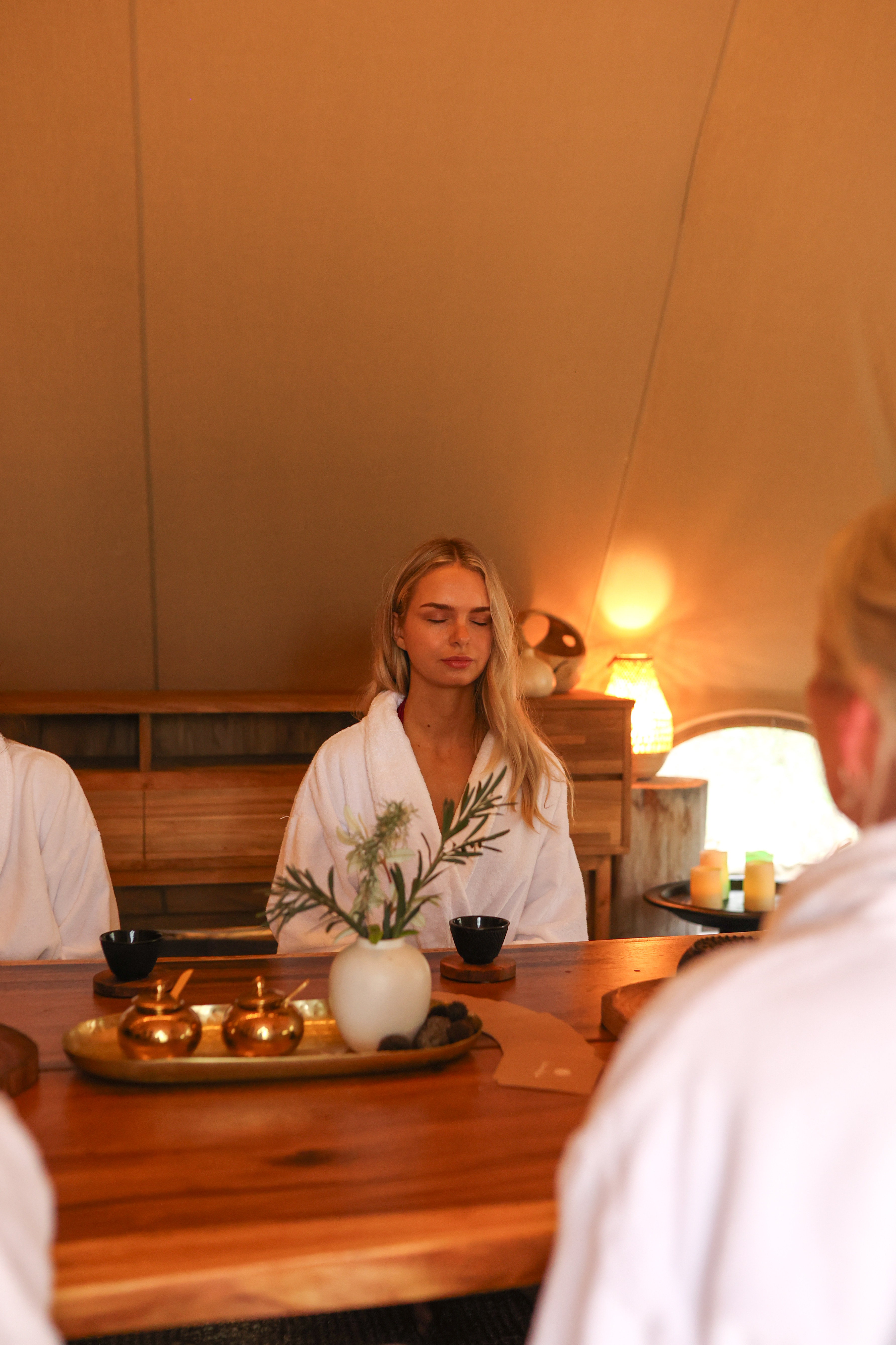 A woman meditating during the Cacao Circle