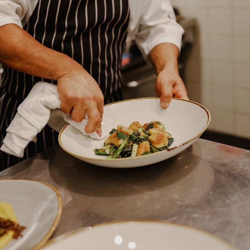 A chef preparing a meal