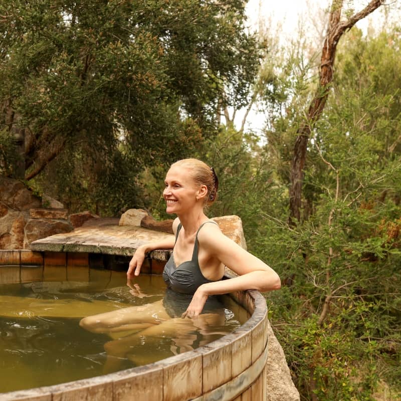 Christmas gifts: A woman relaxing in the sheoak barrel pool