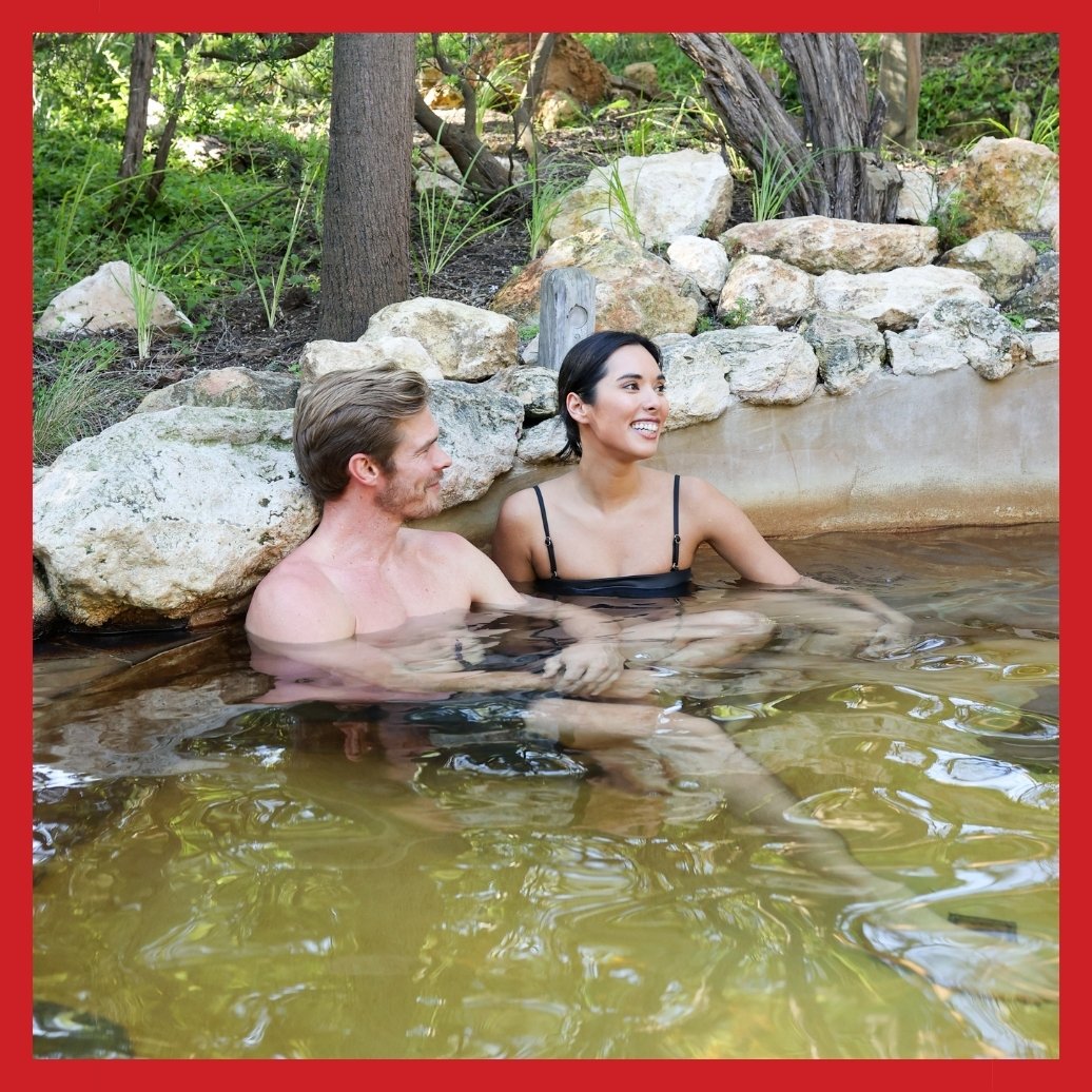 Two people bathing in the Spa Dreaming Centre