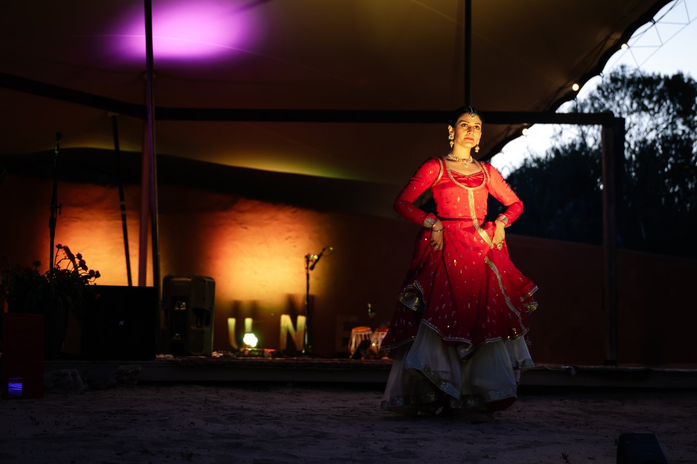 A woman performing on stage for Diwali Festival