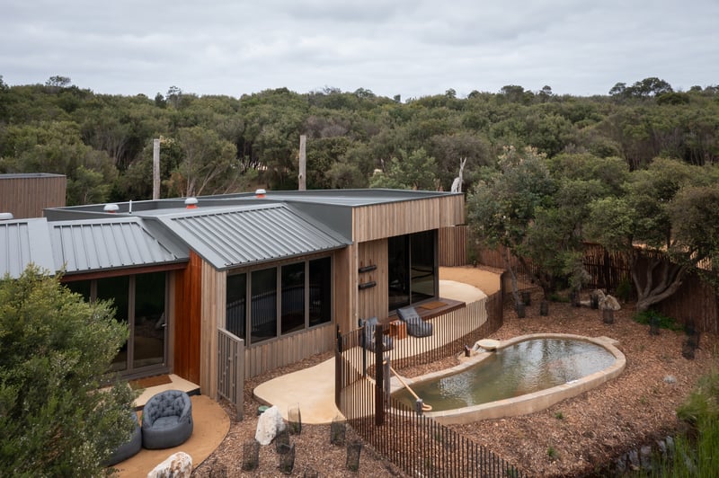 An exterior drone shot of an Eco Lodge