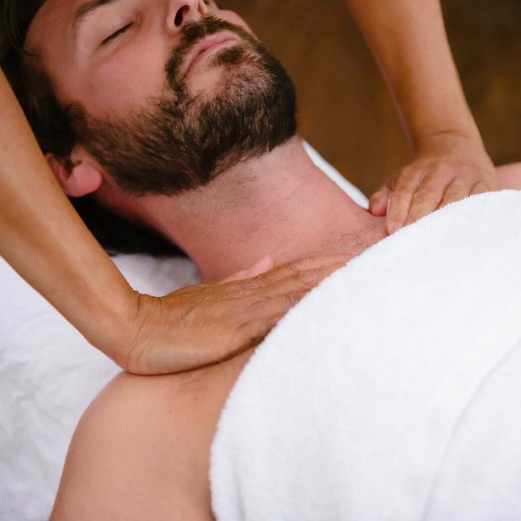 A male receiving a massage