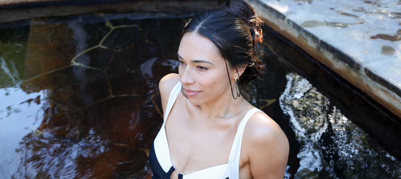 A woman bathing in hot springs