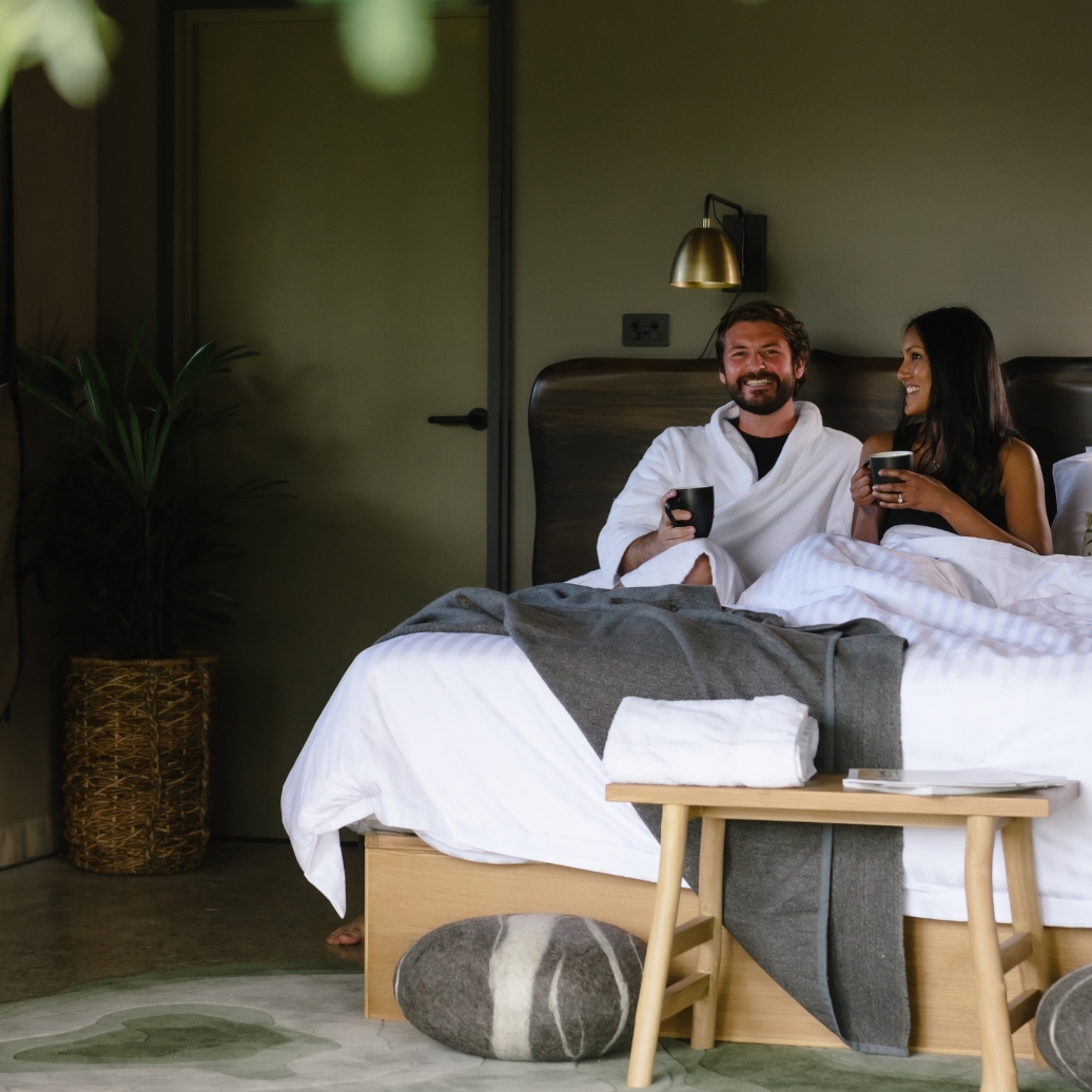 Two people enjoying Glamping