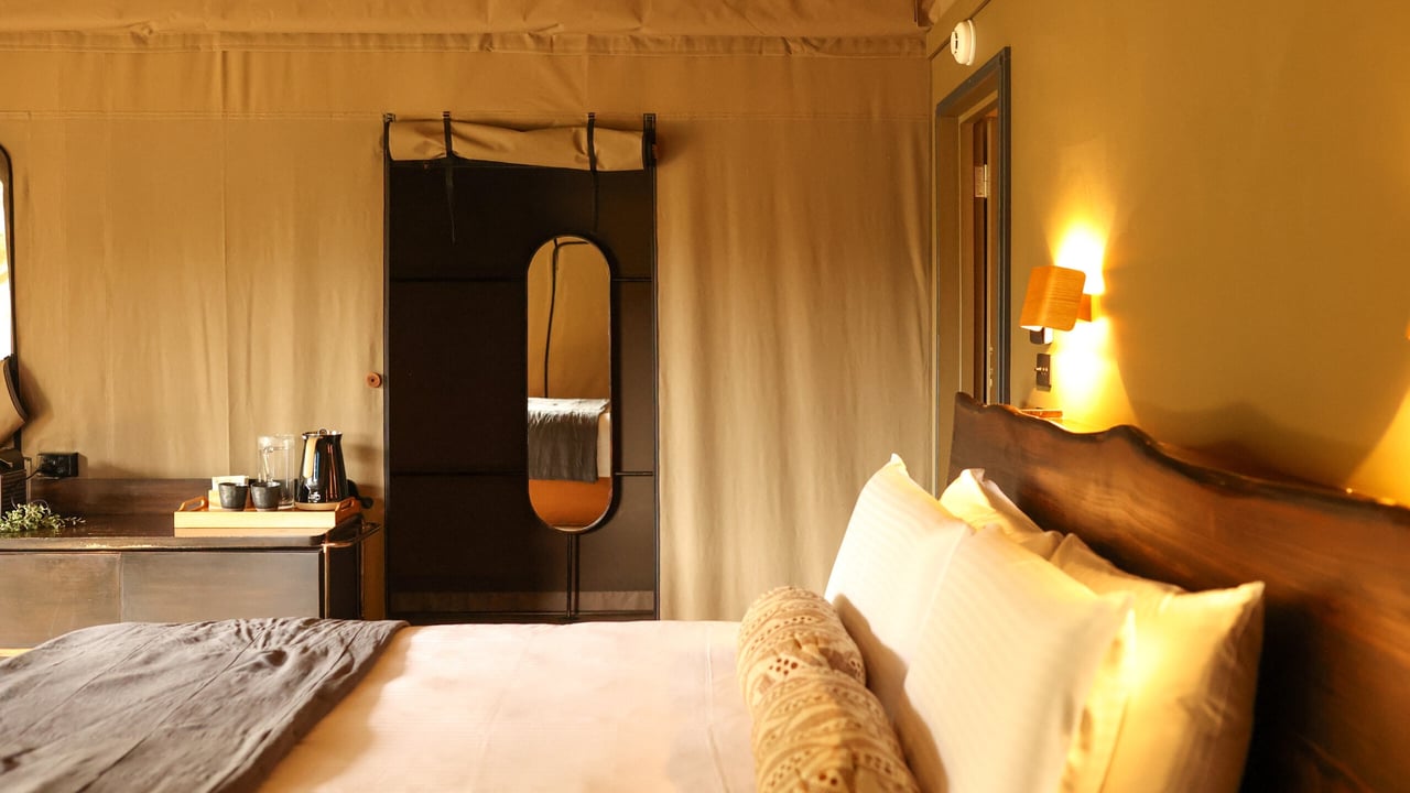 The inside of a Glamping tent room
