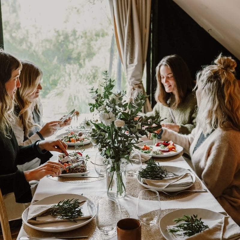 A group of people dining in the Moroccan Pavilion