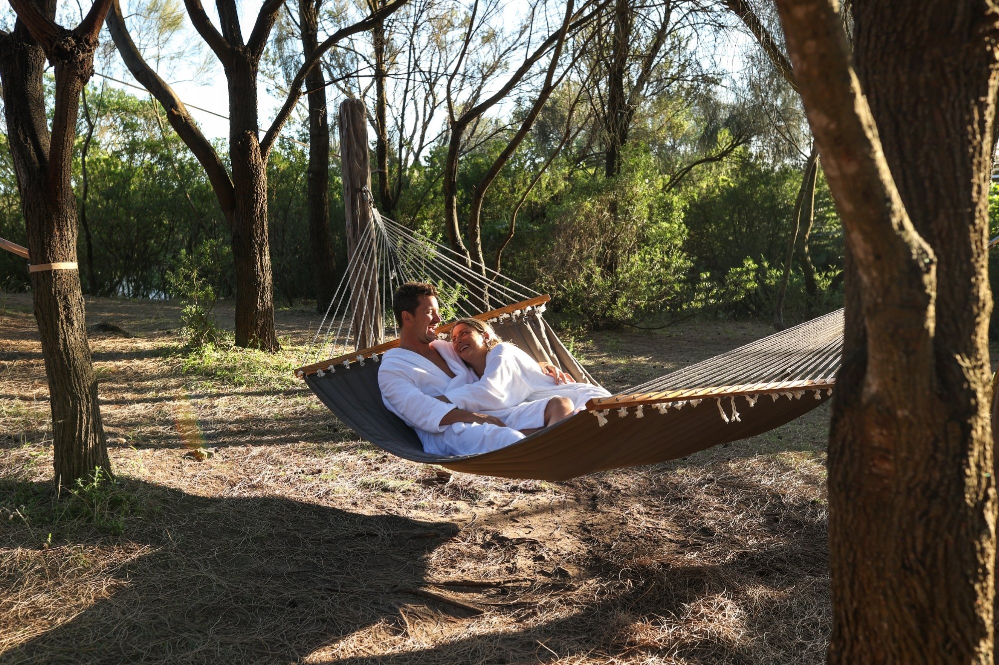 Two people in a hammock