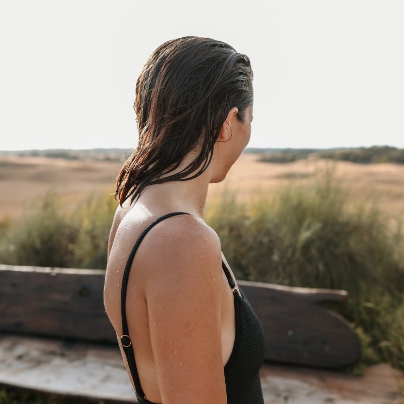 A woman looking out at Hilltop Pool