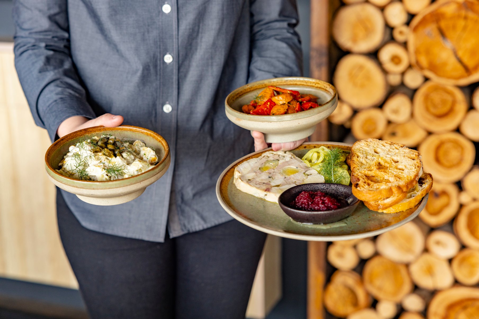 A server with a selection of seasonal dishes