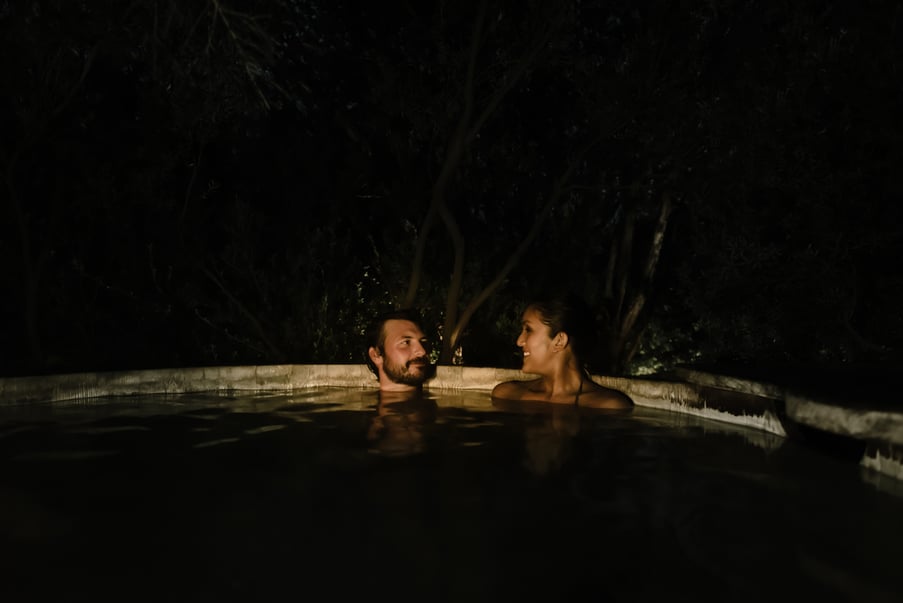 A couple bathing in the evening