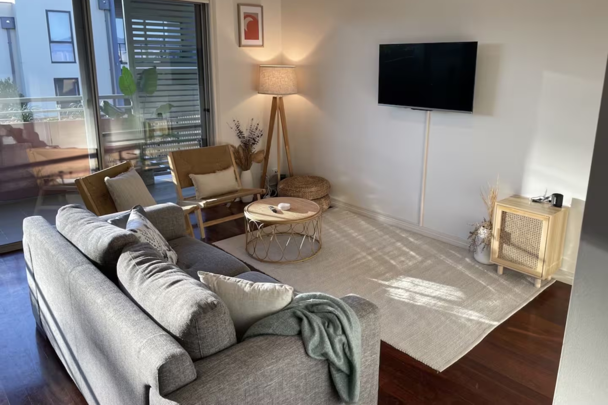 The interior lounge setting of Nirvana Beachfront Stays