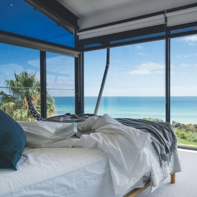 The inside of a room overlooking the ocean