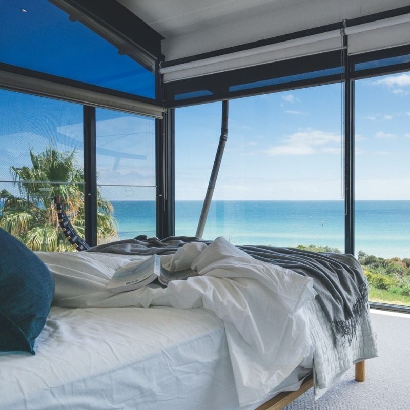 The inside of a room overlooking the ocean