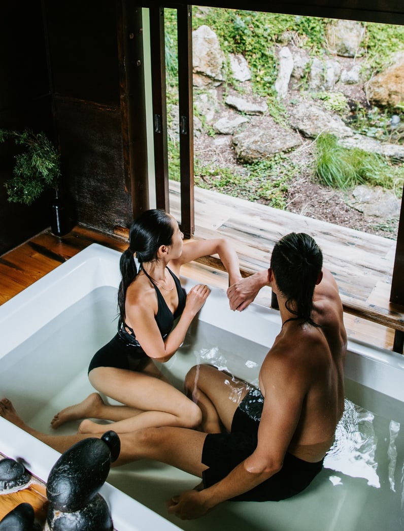 Two people in a private bath