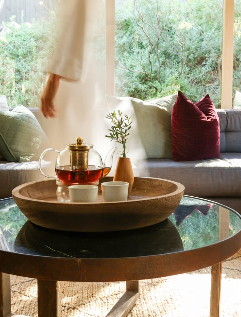 A person walking through the Arabian Marquee relaxation lounge