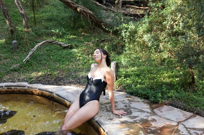 Girl bathing in hot springs