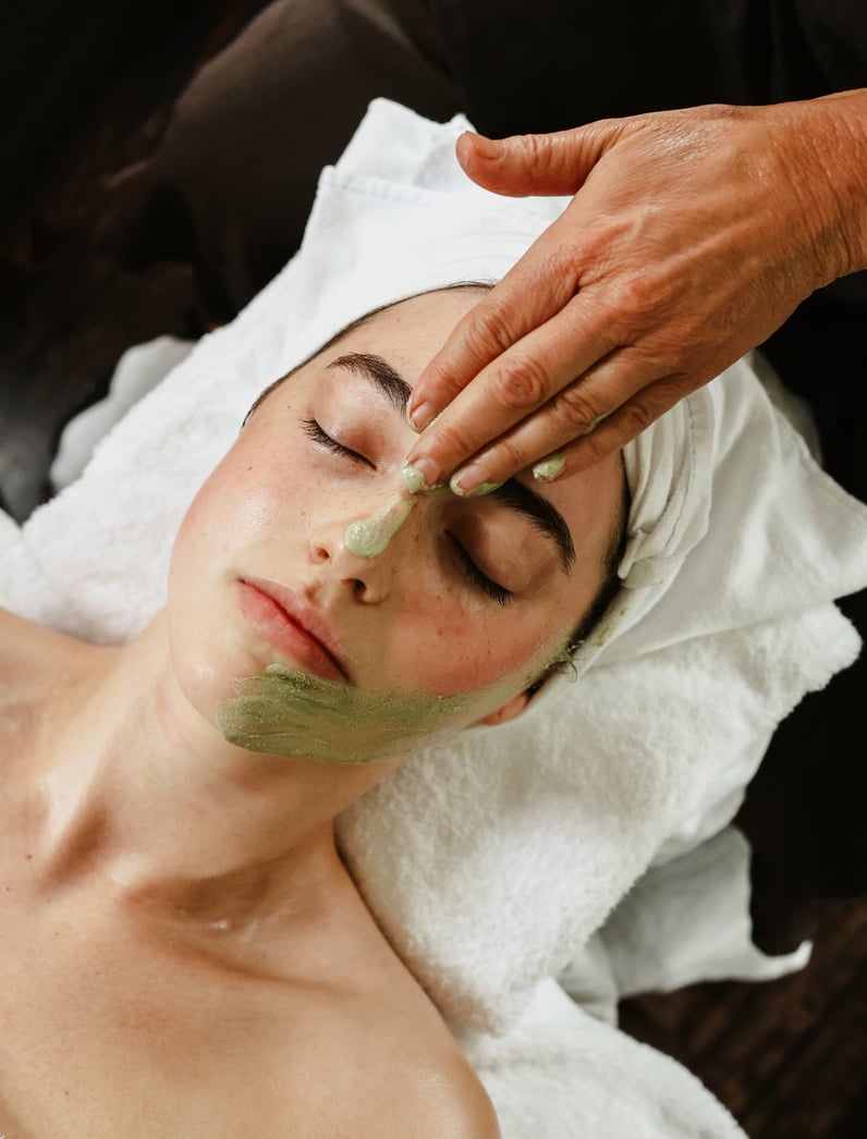 A person having a facial