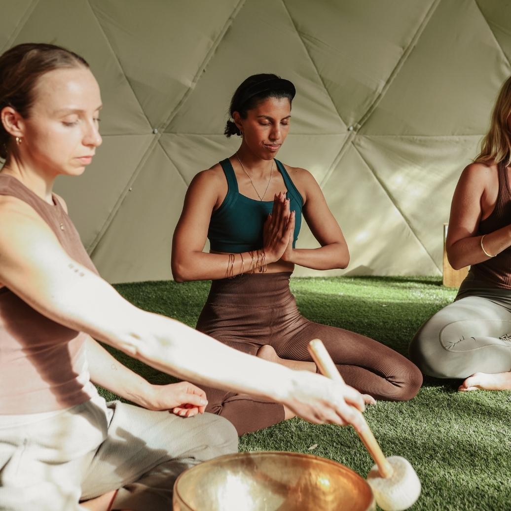 People meditating in the Sound Dome