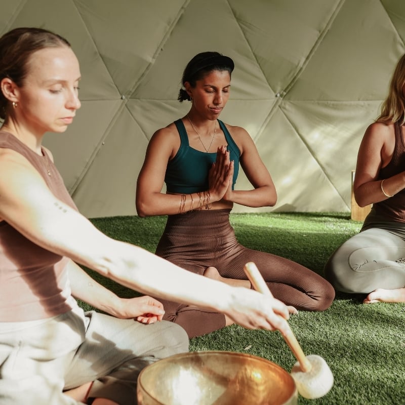 A group doing a sound healing event in the Sound Dome