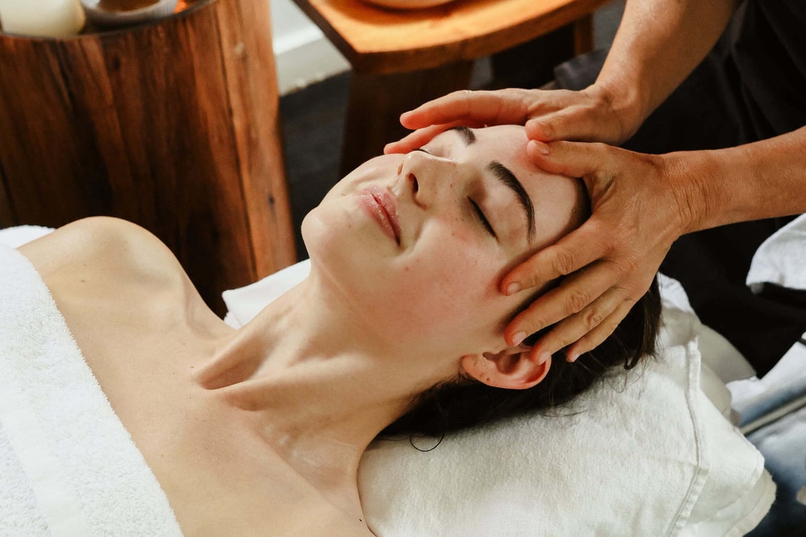 A young woman receiving a spa treatment