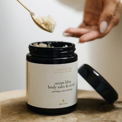 A jar of salt scrub from Synthesis Organics