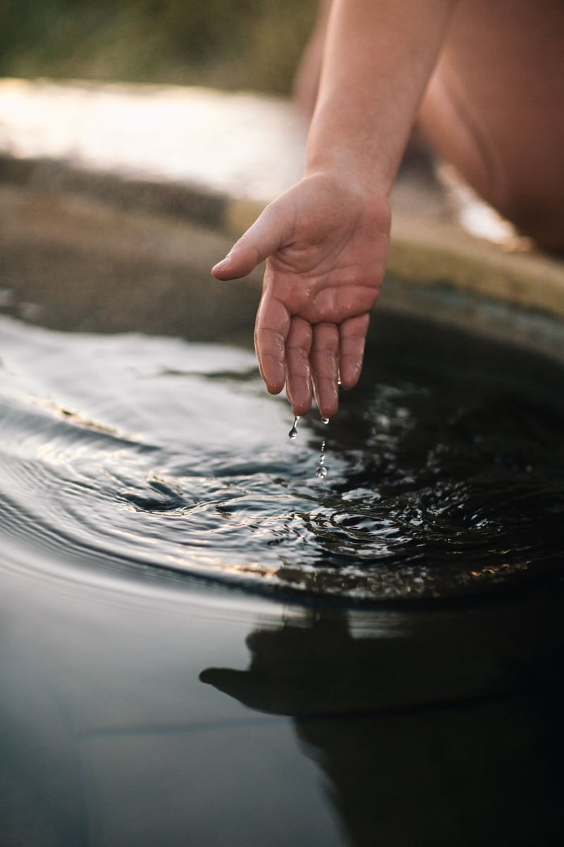 A hand moving through water