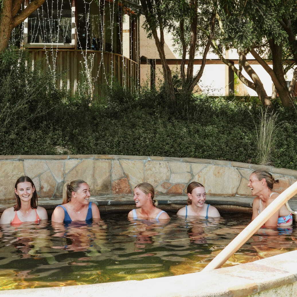 Victorian Women's Cricket Team bathing in hot springs