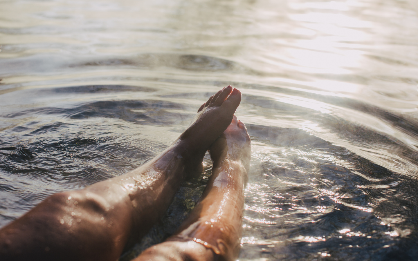 legs-outstretched-in-geothermal-water.png