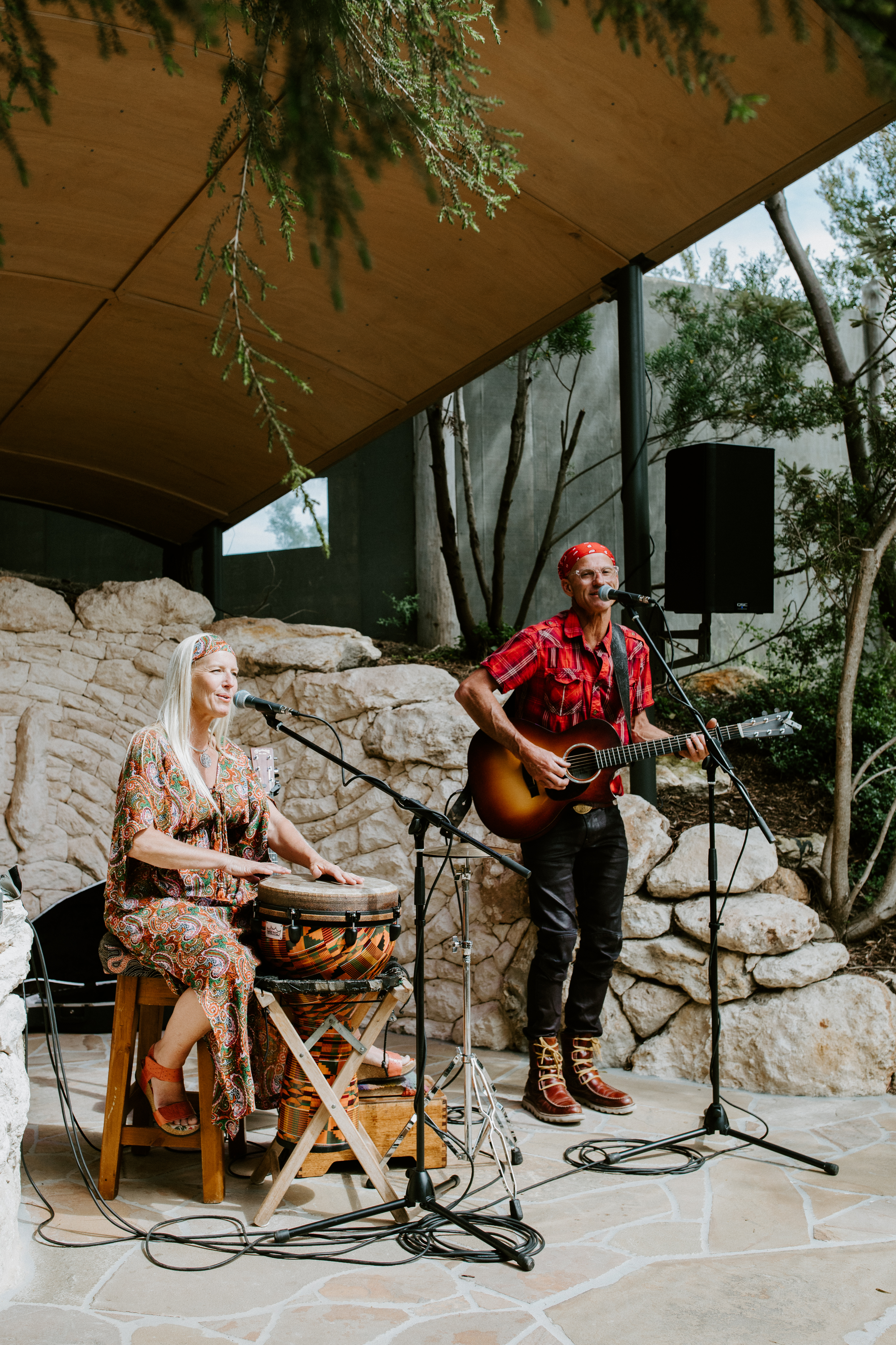 A duo playing live music on the Bath House Cafe stage